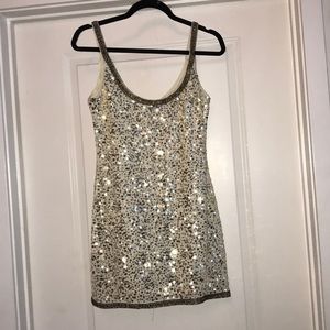 Cream with gold  and brown sequins.